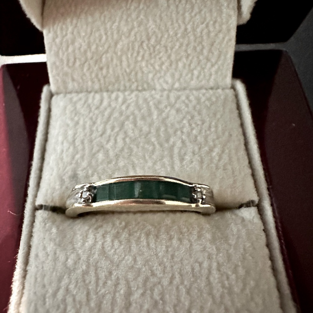 Emerald channel set in 14kt